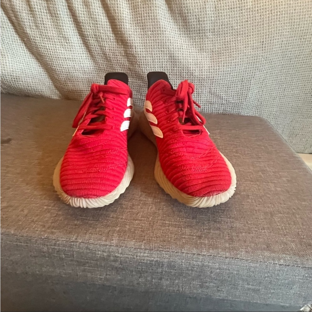 Red adidas three strenuous shoes